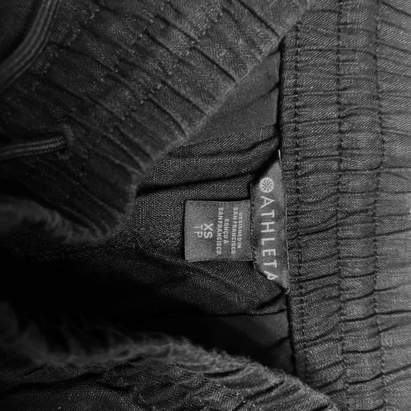 Athleta linen shorts size extra small. Black linen with two pockets drawstring. - Picture 2 of 4